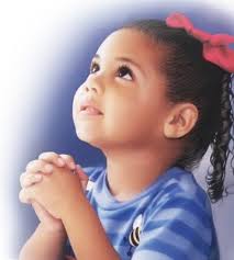 little girl praying